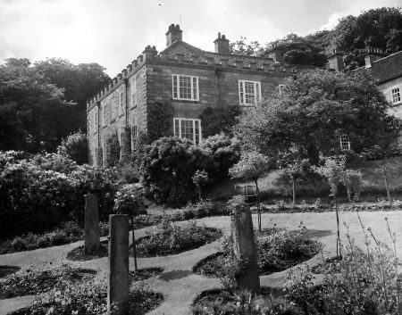 Figure 6. Photograph of stone pillars with roses, 1950s.