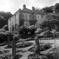 Figure 6. Photograph of stone pillars with roses, 1950s.